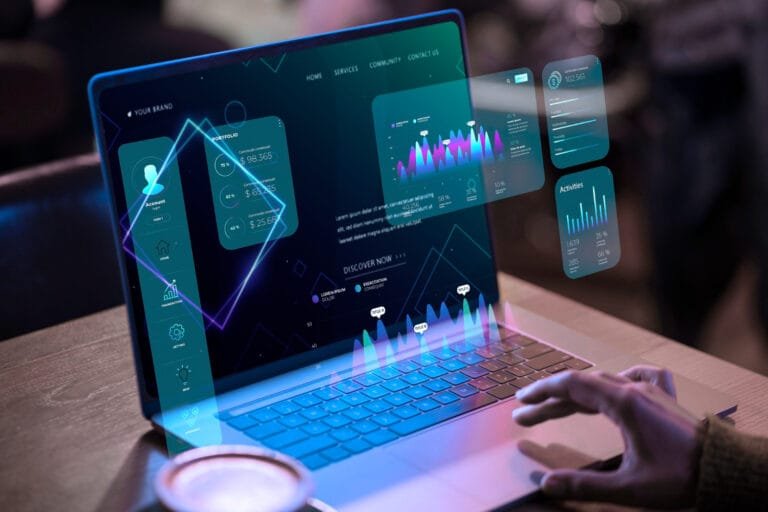 A user interacts with a laptop displaying a futuristic dashboard to symbolise Asia M&A Digital Disruption, featuring data visualizations and portfolio statistics.